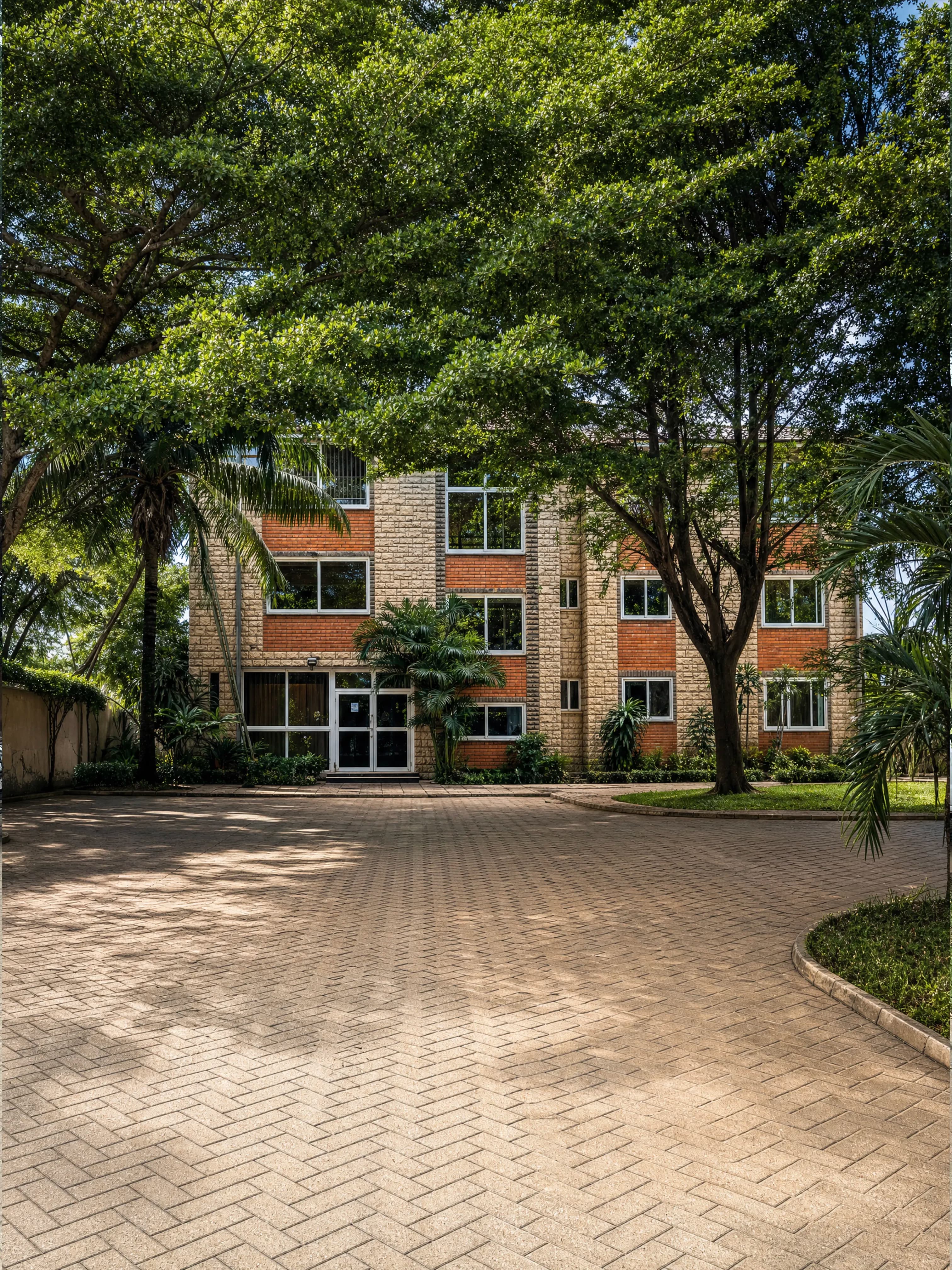 The courtyard at Calabash Green, under mature shade trees